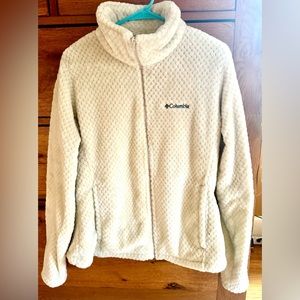 Columbia cream color fleece jacket.  Very soft. Comfy and mark.